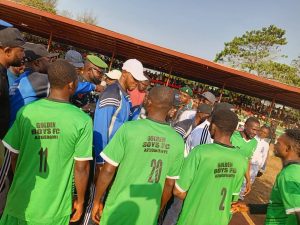 Dr. Darlington Ugota shaking the footballers 
