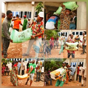 Farmers carrying their bags of Fertilizers 